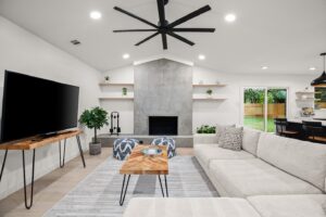 Luxury Living room with big flatsreen tv and outdoor view